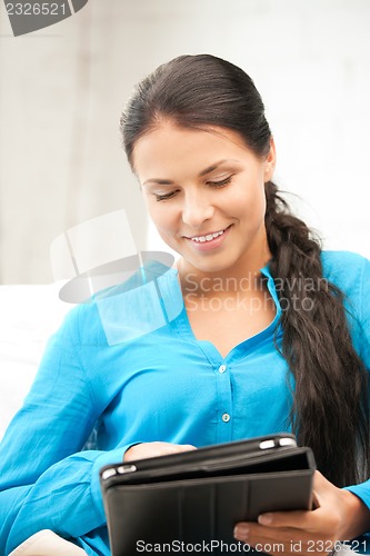 Image of happy woman with tablet pc computer