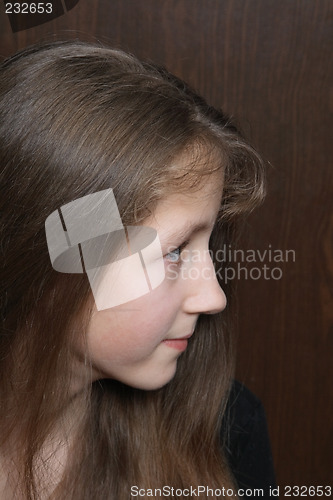 Image of Half face portrait of teenage girl