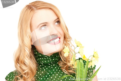 Image of lovely housewife with flower