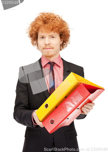 Image of man with folders
