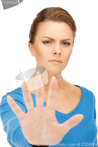 Image of woman making stop gesture