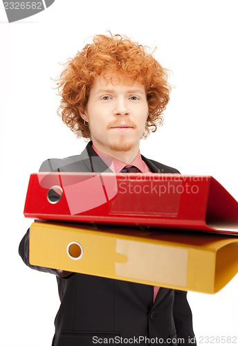 Image of man with folders