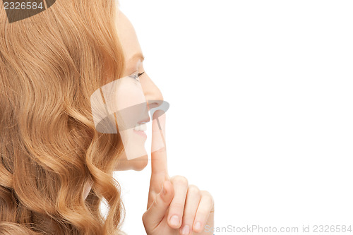 Image of finger on lips