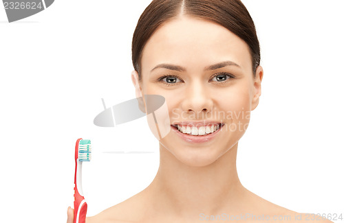 Image of beautiful woman with toothbrush