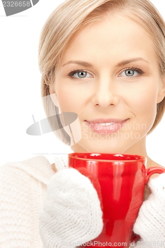 Image of woman with red mug