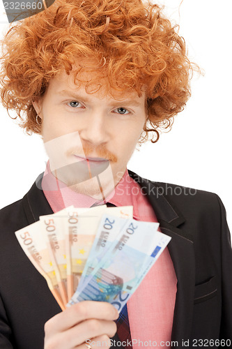 Image of handsome man with euro cash money