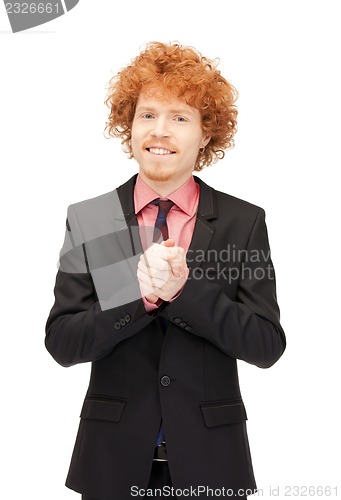 Image of handsome man with expression of tryumph