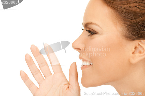 Image of woman whispering gossip