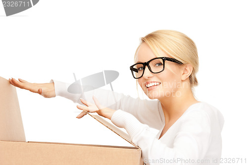 Image of attractive businesswoman with cardboard box
