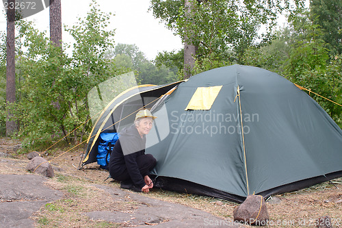 Image of Elderly woman in camping