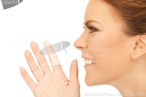 Image of woman whispering gossip