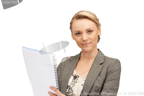 Image of calm woman with big notepad