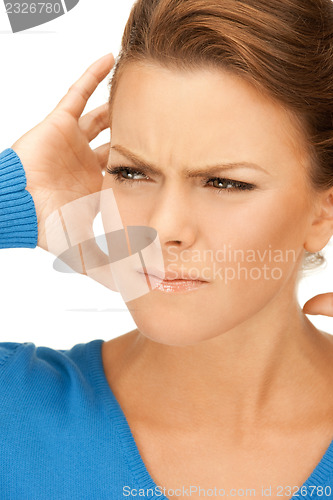 Image of woman with hands on ears