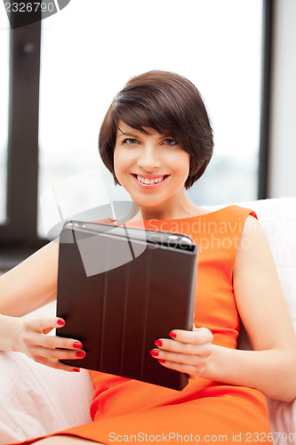 Image of happy woman with tablet pc computer