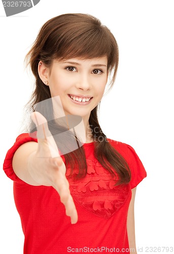 Image of teenage girl with an open hand ready for handshake