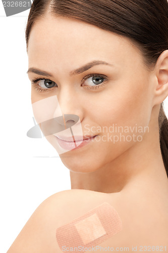 Image of beautiful woman with plaster