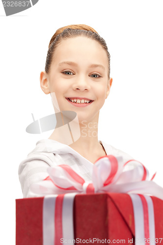 Image of happy teenage girl with gift box