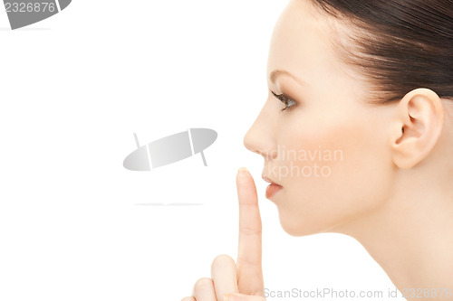 Image of finger on lips