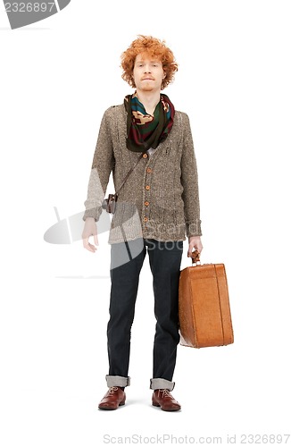 Image of man with suitcase