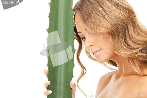 Image of lovely woman with aloe vera