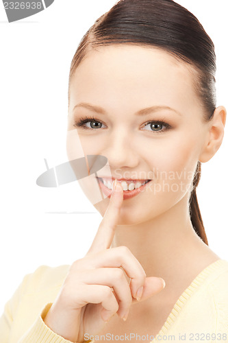 Image of finger on lips