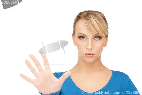 Image of woman making stop gesture