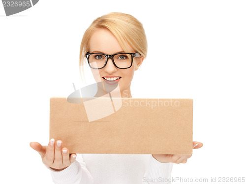Image of attractive businesswoman with cardboard box