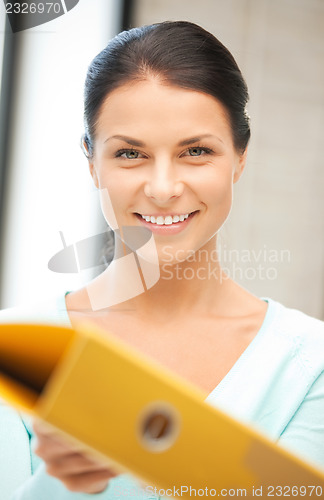 Image of woman with folder