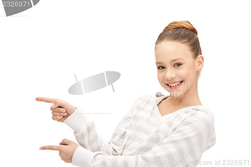 Image of teenage girl pointing her finger