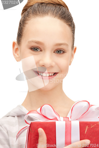 Image of happy teenage girl with gift box