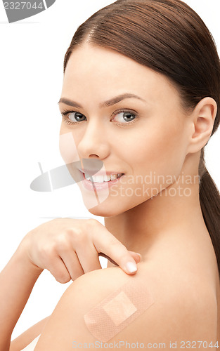 Image of beautiful woman with plaster