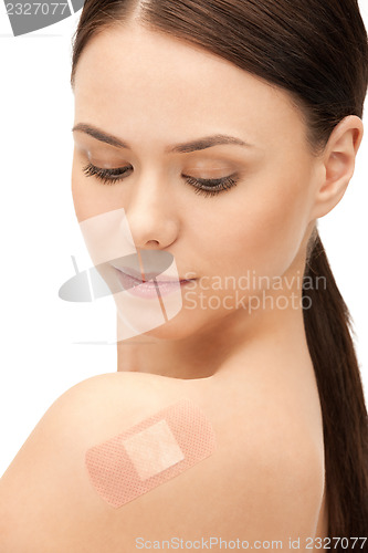 Image of beautiful woman with plaster