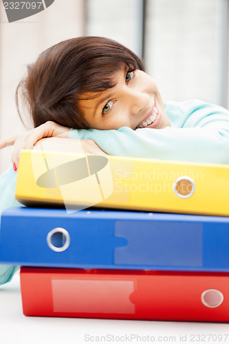 Image of woman with folders