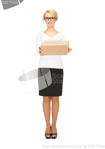 Image of attractive businesswoman with cardboard box