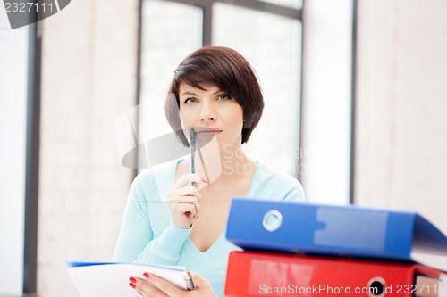Image of woman with folders