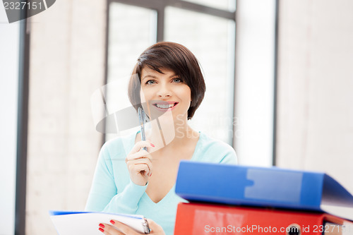 Image of woman with folders