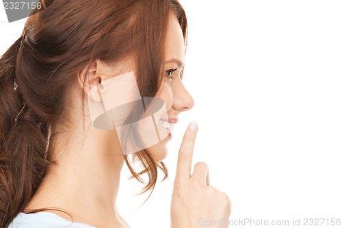 Image of finger on lips