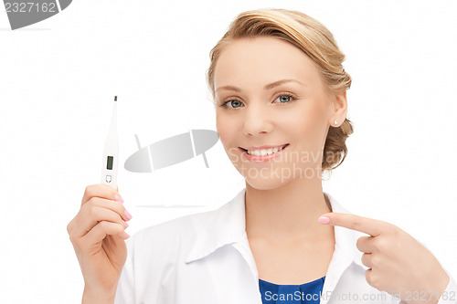 Image of attractive female doctor with thermometer