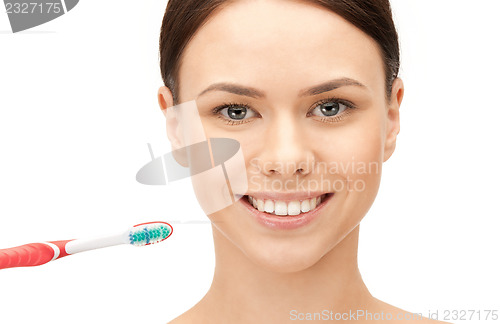 Image of beautiful woman with toothbrush
