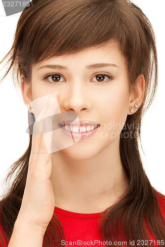 Image of teenage girl whispering gossip