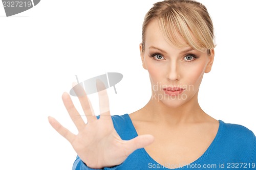 Image of woman making stop gesture