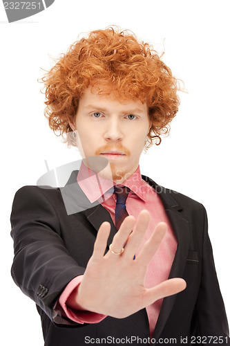 Image of man making stop gesture