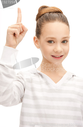 Image of teenage girl with her finger up