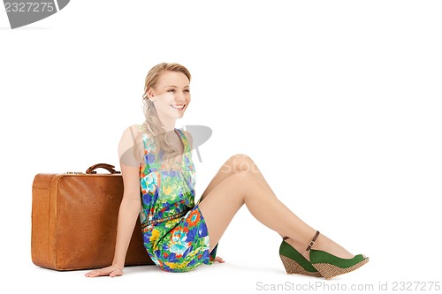 Image of lovely woman with suitcase