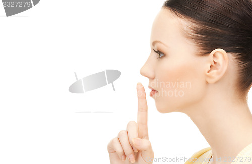 Image of finger on lips