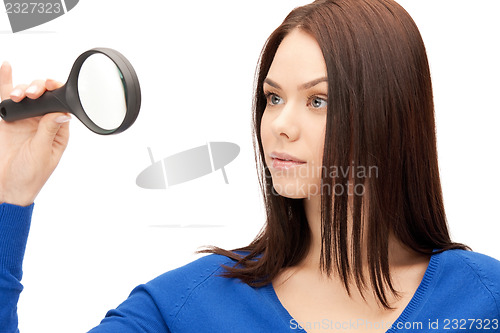 Image of woman with magnifying glass