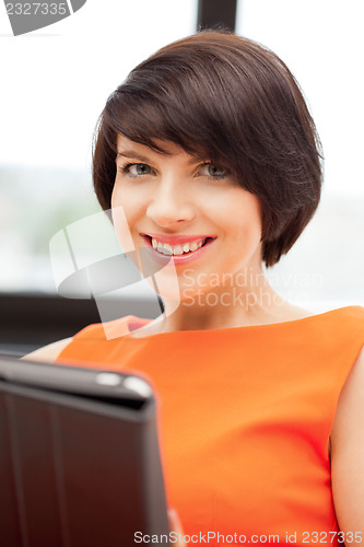 Image of happy woman with tablet pc computer