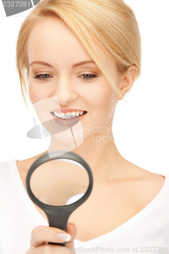 Image of woman with magnifying glass