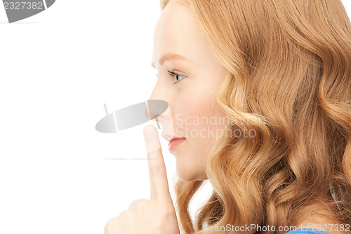 Image of finger on lips