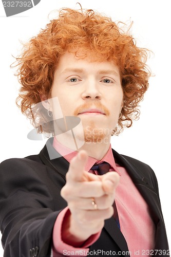 Image of businessman pointing his finger